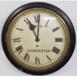 Railway interest: An LNER Doncaster wall clock, 33.5cm wide case, having white enamel Roman