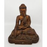 A Chinese carved gilt wood Buddha, height 24.5cm.