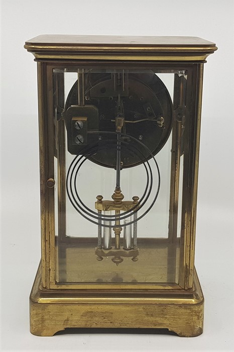 A 20th century French gilt brass mantle clock, gong strike, having circular white dial with Roman - Image 2 of 2