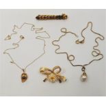 a collection of jewellery and watches, to include: a 14ct. gold "tied bow" brooch, having textured