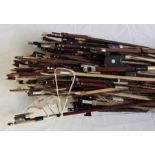 A collection of violin bows. (qty)