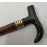 A fine Russian Faberge walking cane, c.1900, having gold mounted nephrite jade handle with a