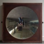 A large WW2 period military parabolic mirror, diameter 114cm, within original wooden frame, 137cm