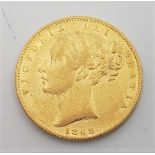 An 1868 Victoria "Young head" gold sovereign, rev. shield, die no.30.