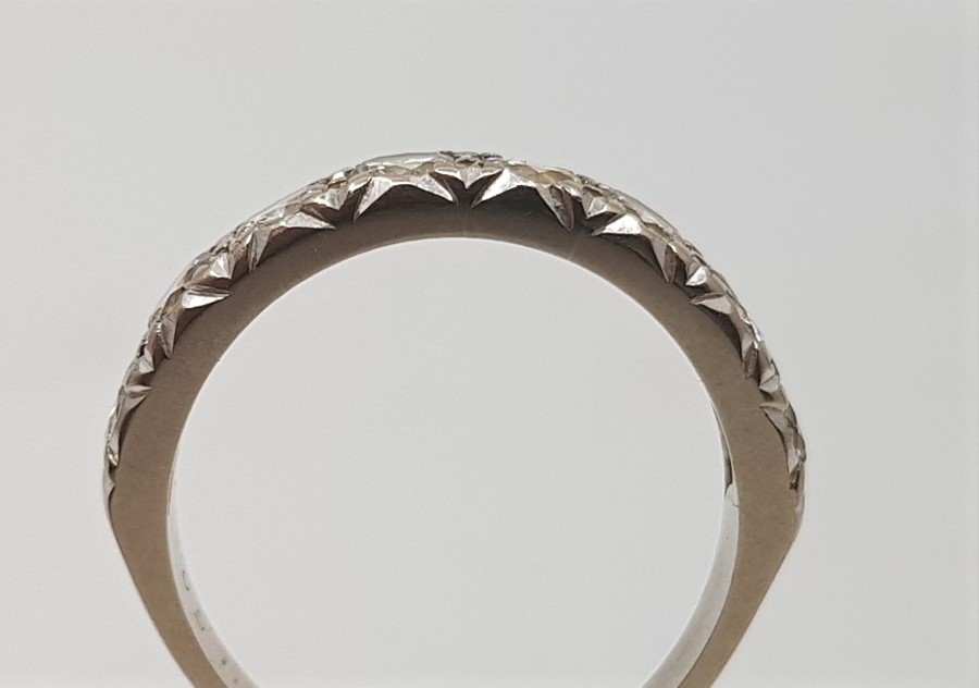 An 18ct white gold eight stone diamond ring, flush set row of eight round brilliant cut diamonds, ( - Image 2 of 2