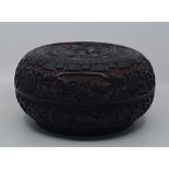 A large Chinese Qing dynasty circular cinnabar box, diameter 28.8cm.
