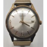 A 9ct, gold Garrard Automatic gentleman's wristwatch, having silvered dial with Arabic and baton