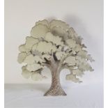 A studio pottery glazed earthenware tree sculpture, having applied groups of foliage to textured