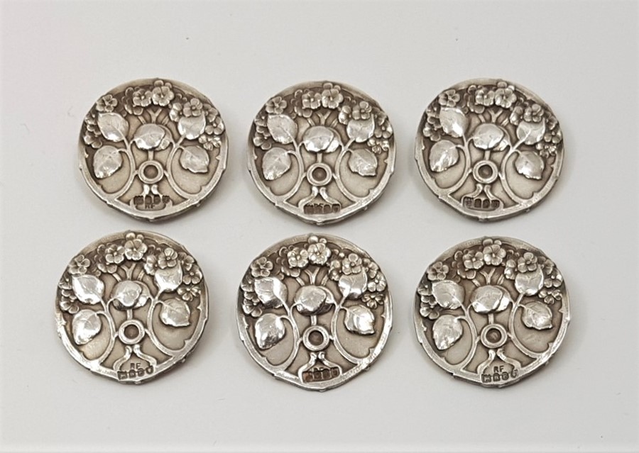 A set of six Art Nouveau silver circular buttons, import assayed London 1903, sponsors mark for