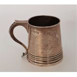 A silver christening mug, by Mappin & Webb Ltd, assayed London 1912, engraved initials to side,