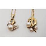 Two 9ct. gold pendants set graduated cultured pearls and diamond, each suspended from fine 9ct. gold