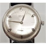 A Gruen 14ct. white gold gentleman's wrist watch, manual movement, having signed silvered circular