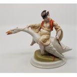 A Herend hand painted porcelain figurine, model no.5515, in the Art Deco style, fashioned as a young