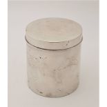 A Japanese silver circular tea caddy and cover, the side and cover lightly engraved fruit and a