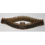 A gun belt of Kynoch 8mm cartridge cases.