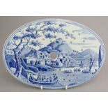 An early nineteenth century blue and white transfer-printed Spode Caramanian series oval drainer c.