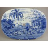 An early nineteenth century blue and white transfer-printed Spode Indian Sporting series drainer,