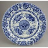 An early nineteenth century blue and white transfer-printed Spode Trophies Etruscan pattern circular