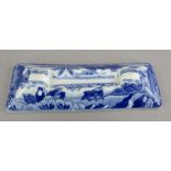 An early nineteenth century blue and white transfer-printed Spode Indian Sporting series knife rest,