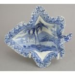 An early nineteenth century blue and white transfer-printed Spode Indian Sporting series leaf-shaped