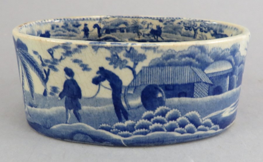 An early nineteenth century blue and white transfer-printed Spode Caramanian series oval pate pan, - Image 2 of 3