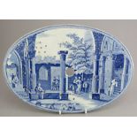 An early nineteenth century blue and white transfer-printed Spode Caramanian series oval drainer,