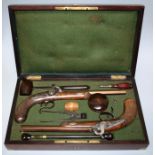 A pair of 19th century brass bound rosewood cased gentlemans/officers percussion dueling pistols wit
