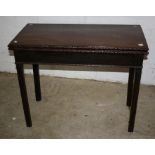 A 19th century mahogany fold over table