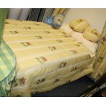 A gold ground floral double bed cover, together with a pair of decorative matching bed drapes and pe