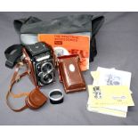 Rollieflex F2.8 TLR camera and case, together with manuals, books and cases