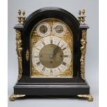 J C Pennens of London. A Victorian eight day triple fusee ebonized boardroom clock with variable chi