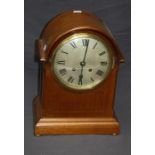 A 19th century brass inlaid mahogany eight day twin fusee mantle clock with simple untitled convex d