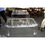 A large 20th century designer canted rectangular lucite coffee table, together with a large bent and