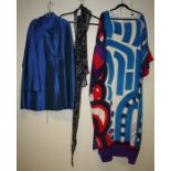 An evening dress for stage in blue,purple white and red together with a long dress in crepe silk and