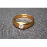 An 18ct yellow gold Gypsy set gents ring with mine cut diamond. 5gm gross weight