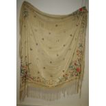 An embroidered floral fringed shawl Formally the property of the late Jessye Norman