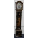 An Edwardian black lacquer and chinoiserie eight day longcase clock. Probably by Maple and Co. The t
