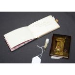 A Victorian papier mache folding Aide Memoire, painted with botanical interior scenes, probably by