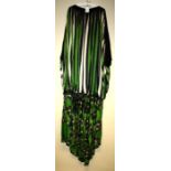 A green and black floral and striped silk stage dress Formally the property of the late Jessye Norma