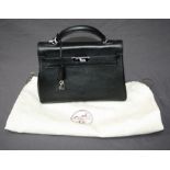 A Hermes style black Kelly bag