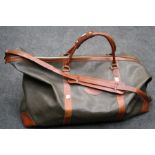 A large Mulberry leather holdall with contrasting handles and trim. 84cm