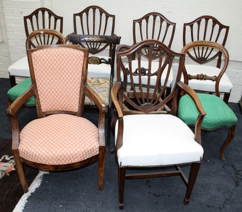 A set of six Hepplewhite design mahogany camel back dining chairs with stuff over upholstery. Togeth