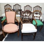 A set of six Hepplewhite design mahogany camel back dining chairs with stuff over upholstery. Togeth