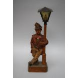 A 1930's German " Whistling Tramp" automaton table lamp, probably by Karl Griesbaum. With polychromi