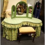 A large chintz draped kidney shaped dressing table and stool. Together with a painted triptytch mirr