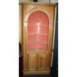A George III style stripped pine architectural corner cupboard with painted interior. 92cm wide