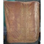 A late 19th century salmon pink ground silk velvet bed cover with classical crewel work decorated wi