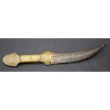 A 19th century camel bone handled jambiya, with engraved iron blade, 24.5cm overall