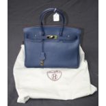 A Hermes style 35 Birkin bag in denim blue