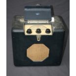A vintage Roberts 32555 radio in black leatherette case